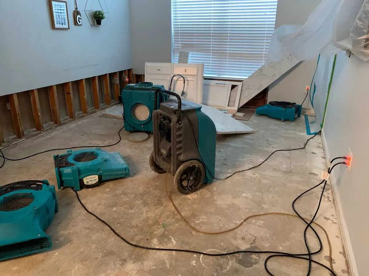 Dehumidifier in flood-cut room for Water Damage Restoration in Tifton
